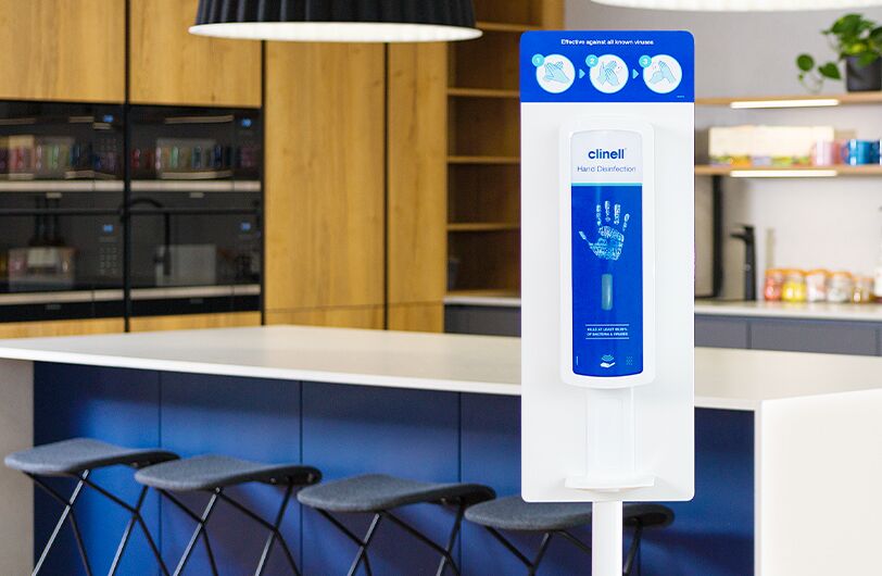 Touch-free Hand Disinfection Free-standing Dispenser in office environment